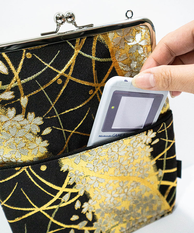 Back pocket detail of black and gold Kinran fabric Japanese shoulder gamaguchi bag