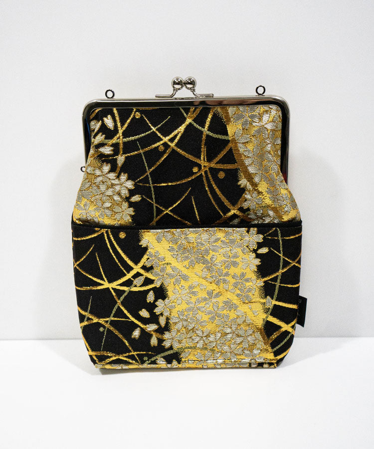 Black clutch bag with gold and silver floral patterns on a white background